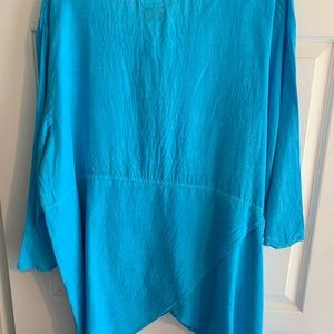 Tunic with asymmetrical hem